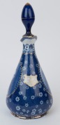 "JAS. WATSON & Co. Ltd. DISTILLERS EST.D 1815 CENTENARY SOUVENIR" English porcelain decanter with vignettes of Lord Kitchener and the Duke of Wellington, circa 1915, ​​​​​​​29cm high - 3