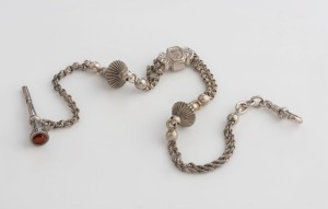 An antique silver Albert fob chain with attached silver pocket watch key, 19th century, 32cm long