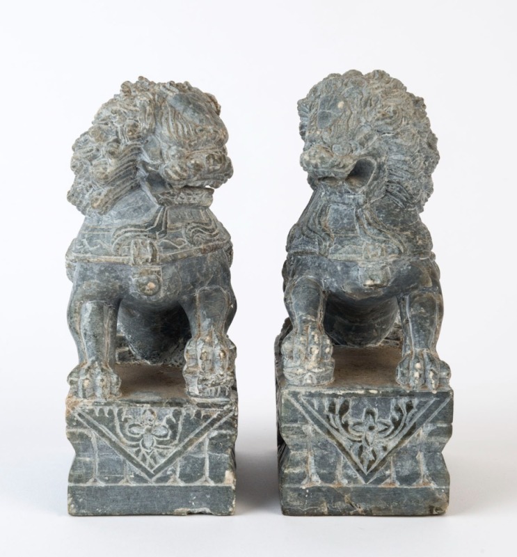 A pair of Chinese carved stone lions, 20th century, ​​​​​​​15cm high