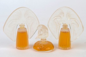 LALIQUE group of three French perfume bottles, glass and plastic, 21st century, the largest 7cm high