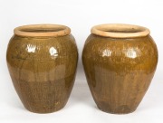 A pair of pottery garden urns, 20th century, 65cm high, 60cm wide