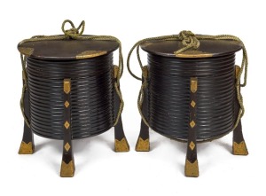 A pair of antique Japanese circular storage boxes, black lacquer and brass, Meiji Period, 19th century, 43cm high, 37cm diameter