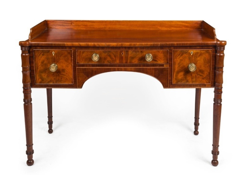 A George III mahogany servery with finely ring turned legs, original brass knobs and whale bone escutcheons, early 19th century, ​​​​​​​85cm high, 120cm wide, 53cm deep