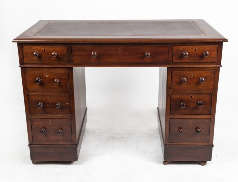 An antique English mahogany twin pedestal ladies desk with burgundy embossed tooled leather top, 19th century, 71cm high, 106cm wide, 60cm deep