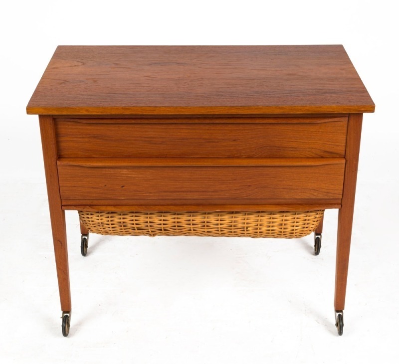 A vintage Danish teak two drawer sewing table with basket undercarriage, circa 1970, 57cm high, 68cm wide, 38cm deep