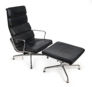 EAMES replica armchair and foot stool, chrome and black leather, bearing label "Charles Eames, The Authorized Original Vitra", the armchair 99cm high, 65cm across the arms