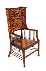 An unusual antique English high back salon chair with fine turned spindles and carved velvet upholstery, 19th century, 102cm high, 62cm across the handles