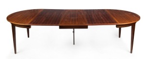 A vintage Danish rosewood extension dining table with fold-down centre leg and three additional leaves, 72cm high, 122cm (extends to 270cm) wide, 122cm deep