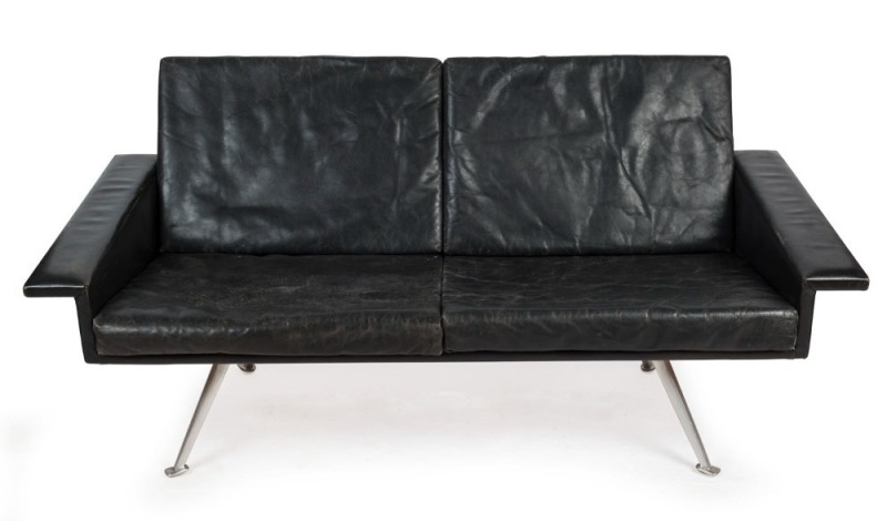 A retro black leather two seat settee with splayed chrome legs, ​​​​​​​166cm across the arms