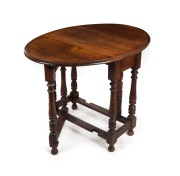 An antique English oak oval drop-side gate-leg occasional table, 19th/20th century, 71cm high, 39cm (extends to 103cm) wide, 75cm deep