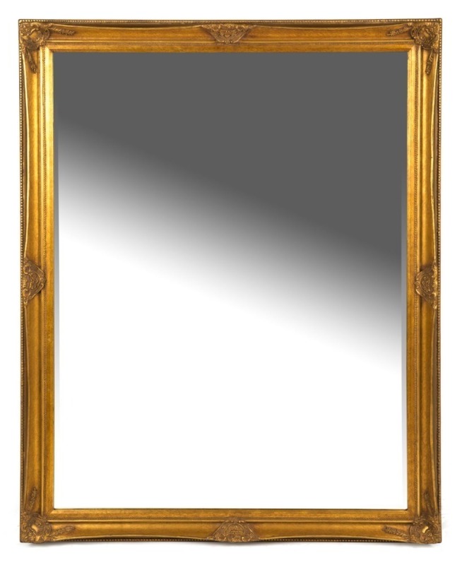 A reproduction gilt framed mirror with bevelled glass, 140 x 108cm overall