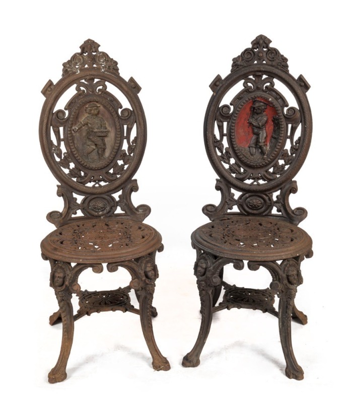 "FOUR SEASONS" pair of antique English cast iron garden chairs, 100cm high