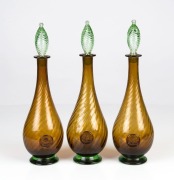 HOLMEGAARD set of three Danish glass decanters, circa 1970, 35cm high