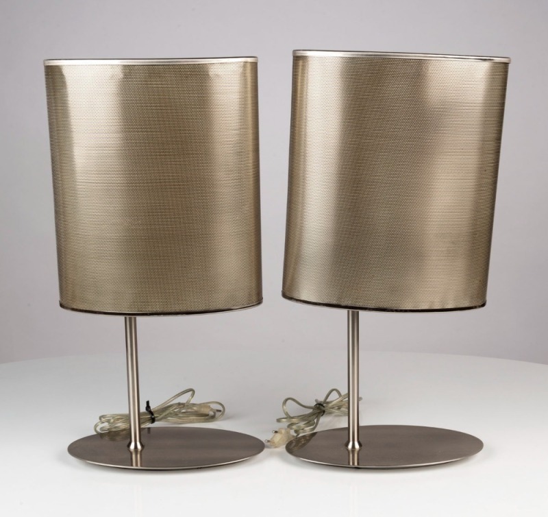 A pair of metal table lamps and shades of oval form, ​​​​​​​Note: Plugs have been removed, 54cm high overall