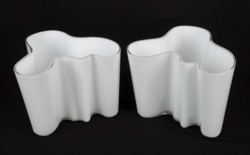 A pair of Scandinavian milk glass vases, A/F, 16cm high, 20cm wide each