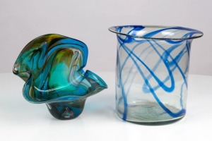 Two Art Glass vases with blue and green swirling design, the larger 24cm high, 25cm diameter