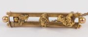 A Colonial 15ct yellow gold double bar brooch with gold nugget specimens, 19th century, ​​​​​​​stamped "15ct", 4cm wide, 4.9 grams - 2