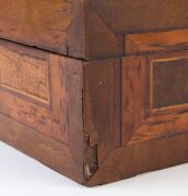 An antique box with starburst top, various timbers including casuarina beefwood, musk, mottled kauri, cedar, ebony, acacia and marri, 19th century, 12.5cm high, 28cm wide, 17.5cm deep - 8