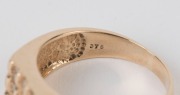 A gent's 9ct yellow gold ring set with 15 diamonds, stamped "375, 9K", - 2