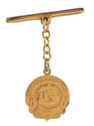 SYDNEY TURF CLUB: 9ct gold HONORARY LIFE MEMBER badge suspended from a bar; the badge numbered "7" verso.