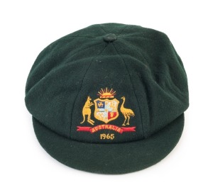 GRAHAM MCKENZIE COLLECTION - 1965 AUSTRALIAN TOUR OF WEST INDIES: Graham McKenzie's "Baggy Green" in green wool with embroidered Australian Coat-of-Arms & '1965' on the front, Farmer's maker's label on the inside marked 'GRAHAM McKENZIE'. In very good condition. The West Indies won the series 2-1. McKenzie appeared in all 5 Tests taking 17 wickets. His 5 for 33 in the West Indies 2nd Innings of the Fifth Test helped Australia secure their only win of the Test series.