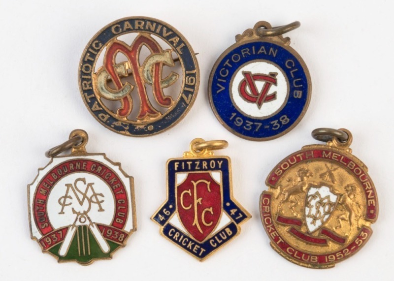 A range of enamelled membership fobs comprising a 1917 Patriotic Carnival badge, a 1937-38 South Melbourne Cricket Club bob, 1937-38 Victorian Club fob, 1946-47 Fitzroy Cricket Club fob and 1952-53 South Melbourne Cricket Club fob, (5 items). 