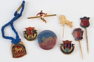 FITZROY FOOTBALL CLUB: Various pins, badges, a fob and a club tie-pin; the earliest dated 1950. (8 items).