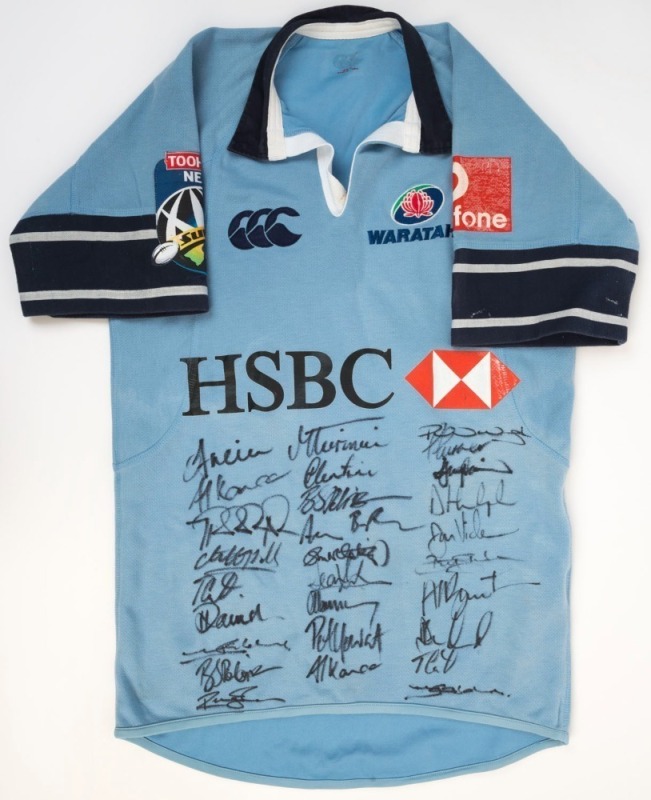 NSW WARATAHS: No '12' guernsey with 28 signatures including Phil Waugh, Dan Vickerman & Brendan Cannon.