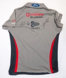 FORD/VODAPHONE V8 SUPERCARS: size 16 polo shirt, signed on reverse by Craig Lowndes & Jamie Whincup.