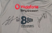 FORD/VODAPHONE V8 SUPERCARS: size 16 polo shirt, signed on reverse by Craig Lowndes & Jamie Whincup. - 2