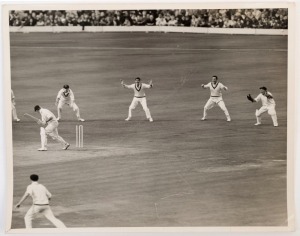GRAHAM MCKENZIE COLLECTION - 1961 ASHES TOUR OF ENGLAND: Mostly press action photos from the tour, a few annotated in Graham McKenzie's hand including his dismissal of Colin Cowdrey on the first day of 2nd Test Match at Lords, annotated on reverse "My 1st Test Wicket", another showing McKenzie walking off the ground after being dismissed during a tour match at Leicester annotated on reverse "This match was the first time I got 5 wickets in an innings; 5/60 1st Innings";