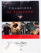 ESSENDON: "Champions of Essendon - Ranking the 60 Greatest Bombers of all Time" poster (repair), boldly signed by Terry Daniher and Kevin Sheedy; also  VFL Reserve passes (9, 1982-86 & 1988-92) for Essendon Club Matches; also  MELBOURNE: Ron Barassi signa - 2