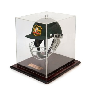 SHANE WARNE (1969-2022) -1993 ASHES SERIES AUSTRALIAN TEAM BATTING HELMET: Worn during Warne's first Ashes tour of England where he became the leading wicket taker for the six-Test series with 34 wickets. It was in this series, on the 2nd Day of the First Test at Old Trafford, that Warne produced the legendary "Ball of the Century" bamboozling Mike Gatting with a leg-break which pitched outside leg, then turned viciously to clip the off-stump. Signed to the front of the helmet.