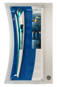 SYDNEY 2000 OLYMPIC TORCH, aluminium and stainless steel, in perspex display case with details of the Torch's inspiration, design & technical aspects, limited edition 423/2000 created to replicate the torches carried by the Torchbearers, overall 54x89cm. 