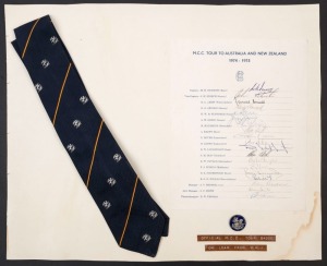 M.C.C. TOUR TO AUSTRALIA AND NEW ZEALAND 1974-75: official M.C.C. team sheet fully signed in pen by the whole touring party of 19, including Denness (Capt.), Edrich (Vice-Capt.), Amiss, Grieg, Knott and Willis; mounted together with an official M.C.C. Tour badge and the team tie. (3 items).