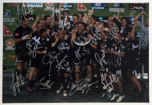 PLAYER SIGNED COLOUR PRINTS: comprising Melbourne Victory 2006-07 Premiership team photo, signed by whole team (16 signatures), Australian players Brett Emmerton & Mark Schwarzer signed action photos, these all 45x30cm; also magazine cut-out (22x29cm) sig