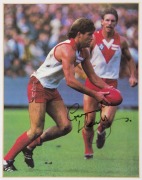 PLAYER AUTOGRAPHED ACTION IMAGES: matt finish images, all 27x19cm and window mounted on card, comprising ESSENDON: Simon Madden & Terry Daniher; MELBOURNE: Sean Wright: RICHMOND: Dale Weightman&nbsp;& Michael Roach; SYDNEY SWANS: Gerard Healy. (6) - 2