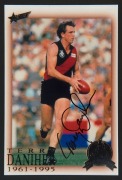 PLAYER AUTOGRAPHED ACTION IMAGES: matt finish images, all 27x19cm and window mounted on card, comprising ESSENDON: Simon Madden & Terry Daniher; MELBOURNE: Sean Wright: RICHMOND: Dale Weightman&nbsp;& Michael Roach; SYDNEY SWANS: Gerard Healy. (6) - 6