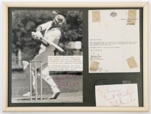 BOB HAWKE - SIGNED PHOTOGRAPH: display featuring a photograph by Canberra Times photographer Peter Wells, catching the moment when Hawke is struck in the face, breaking his glasses, whilst batting in a cricket match against the Press in Canberra, November
