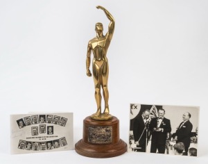 GRAHAM MCKENZIE COLLECTION - 1965 AUSTRALIAN TOUR OF WEST INDIES: Western Australian 'Sports Star of the Year' award, presented to Mckenzie for 'Outstanding Performance 1964-65', being a stylized metal figurine mounted on a wooden base, 33cm high; also photograph of Eric McKenzie accepting the award on behalf of his son from WA Premier Sir David Brand, whilst Graham was in British Guiana; also a 1965 Tour promotional postcard showing Australian team members