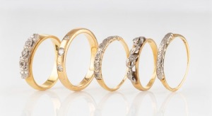 Five vintage and antique 18ct yellow gold rings set with diamonds, early 20th century, all stamped "18ct", ​​​​​​​15 grams total