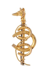 An antique 9ct yellow gold fox hunting brooch with fox head riding crop, horseshoes and entwined rope, 19th century, stamped "9, J. & L. 375" with pictorial marks, 4.6cm wide, 2.9 grams
