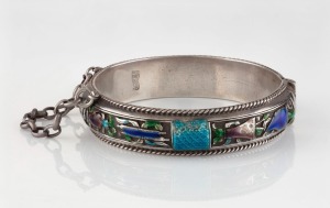 An antique Chinese silver and enamel bangle, circa 1900, two character seal mark, 6.5cm diameter