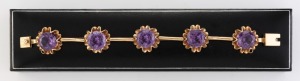 A stunning 14ct yellow gold cocktail bracelet, set with five impressive brilliant cut alexandrite stones, circa 1970, stamped "R.K. 14K", 20cm long, 45.7 grams total