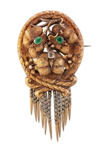 LAMBORN & WAGNER antique Colonial Australian yellow gold brooch of oval form with tassel fringe and applied leaves set with green and white stones, 19th century, tests as 15ct gold or higher, ​​​​​​​6.5cm high overall, 11.2 grams total