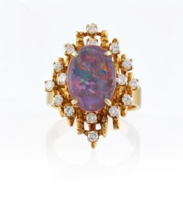 A designer 14ct yellow gold cocktail ring set with opal doublet and diamonds, circa 1970, stamped "14K", 9.9 grams