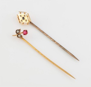 Two antique gold stickpins set with sapphire, seed pearls and red stone, 19th century, 6.5cm long