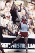 MELBOURNE - SIGNED PLAYER PHOTOS: selection including Ron Barassi, Jack Watts, Tom Scully, Russell Robertson & Liam Jurrah; various sizes, largest 20x30cm, generally very good condition. (12) - 2