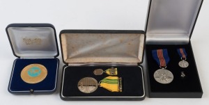 SWIMMING - DON TALBOT: Medallions presented to Talbot comprising 1991 for Swimming World Cup, 2000 Australian Sporting Achievement Medal, 2001 Centenary of Federation/Contribution to Australian Society medal & cuff link; all in original presentation cases
