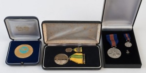 SWIMMING - DON TALBOT: Medallions presented to Talbot comprising 1991 for Swimming World Cup, 2000 Australian Sporting Achievement Medal, 2001 Centenary of Federation/Contribution to Australian Society medal & cuff link; all in original presentation cases; also 1979 International Swimming Hall of Fame plaque awarded to Talbot for "Outstanding Achievement as an Honor Coach" (4)